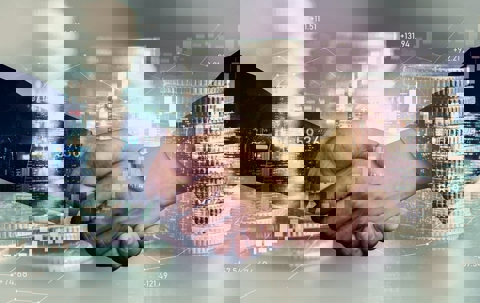 handshake with graphs graphic overlay