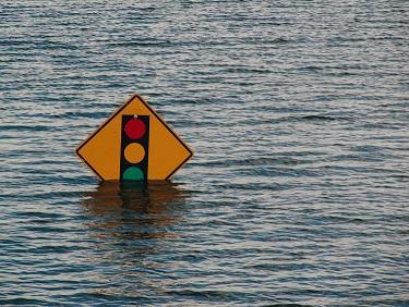 stop sign under water