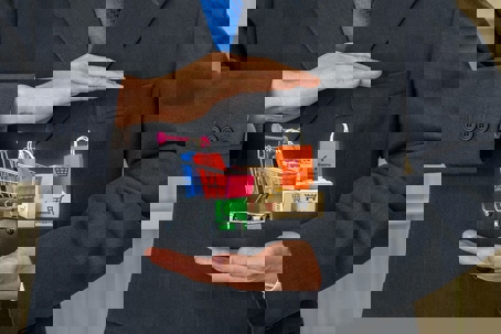 business man with virtual shopping cart