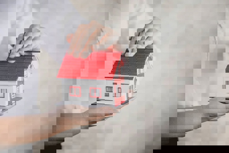 Holding a small house